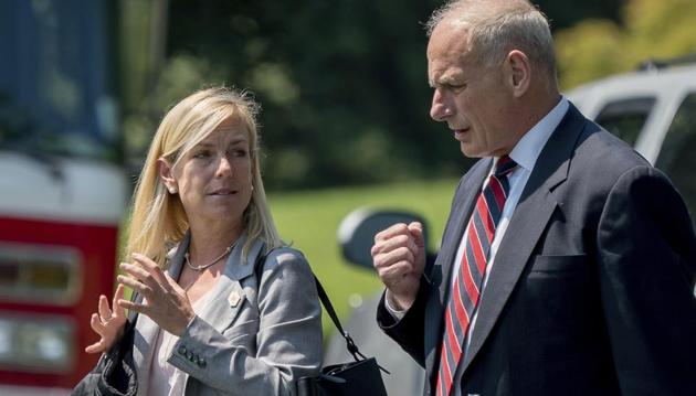 White House Chief of Staff John Kelly and Deputy Chief of Staff Kirstjen Nielsen speak as they walk across the South Lawn of the White House in Washington. (AP File) White House Chief of Staff John Kelly and Deputy Chief of Staff Kirstjen Nielsen speak as they walk across the South Lawn of the White House in Washington. (AP File)