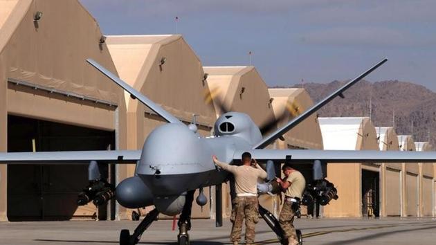 US airmen prepare a US Air Force MQ-9 Reaper drone as it leaves on a mission at Kandahar Air Field, Afghanistan March 9, 2016.(Reuters Photo)
