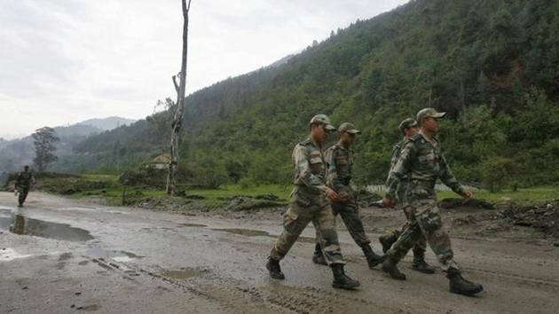 A file photo of army soldiers marching near an army base on India's Tezpur-Tawang highway. (Reuters) A file photo of army soldiers marching near an army base on India's Tezpur-Tawang highway. (Reuters)