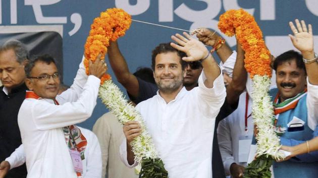 Congress party vice president Rahul Gandhi being garlanded during a public meeting at Bodeli in Chhota Udaipur district of Gujarat on Tuesday. (PTI) Congress party vice president Rahul Gandhi being garlanded during a public meeting at Bodeli in Chhota Udaipur district of Gujarat on Tuesday. (PTI)