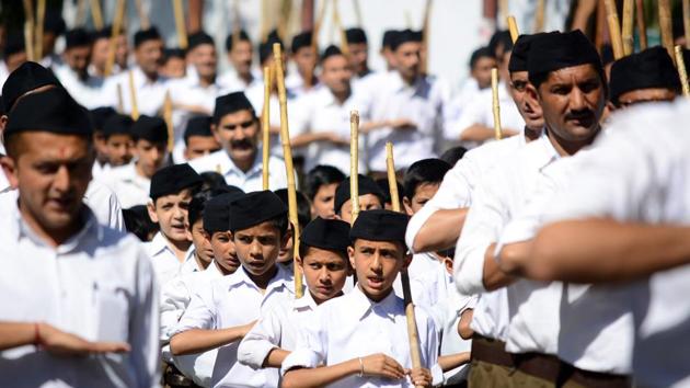 Volunteers participate in an RSS parade in Shimla.(Deepak Sansta/HT Photo) Volunteers participate in an RSS parade in Shimla.(Deepak Sansta/HT Photo)