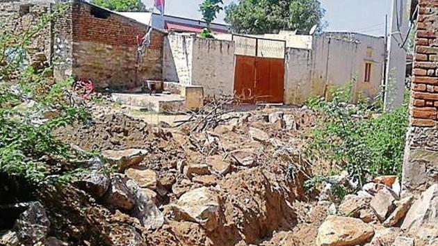 Partially blocked entrance to the house of Kaluram Meghwal, the brother of the bride, in Pali.(HT Photo)