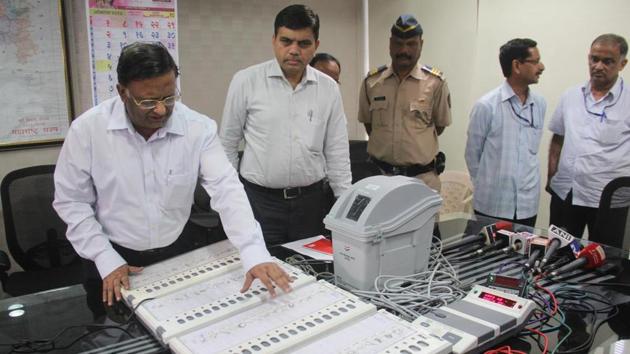 State Election commissioner, J S Saharia, inspecting a new Voter Verifiable Paper Audit Trail (VVPAT) machine in Nanded(HT File)