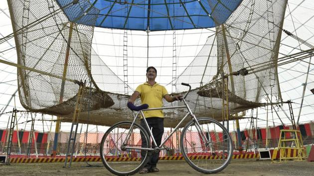 Subhash, an artist from Bengal at the Asiad Circus claims to have taken a lot of risks in his lifetime while at work. ‘ I just want that the government should provide us subsidies so that we can make some profit from our performances,’ he says. (Sanchit Khanna / HT PHOTO)