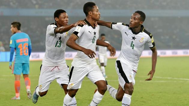 New Delhi: Ghana's Eric Ayiah (C) and teammates celebrate after scoring a goal against India during their U-17 FIFA World cup football match in New Delhi on Thursday. PTI Photo by Vijay Verma (PTI10_12_2017_000215A) (PTI)