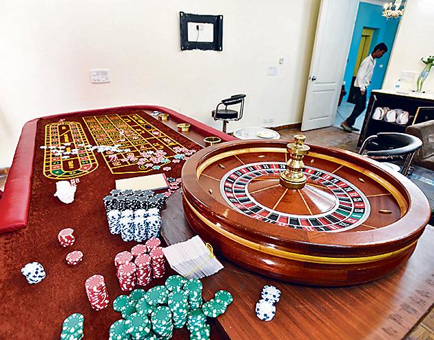A casino table seized during the gambling den bust on Wednesday night. (Sanjeev Verma/HT PHOTO) A casino table seized during the gambling den bust on Wednesday night. (Sanjeev Verma/HT PHOTO)