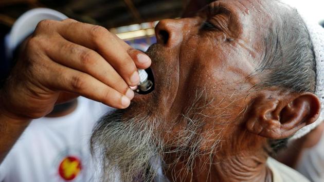 A Rohingya refugee man gets an oral cholera vaccine with the help of volunteers and local NGO’s in Bangladesh. Cholera is known to kill 95,000 people each year and affects an additional 2.9 million people worldwide.It’s an acute diarrheal infection caused by ingesting contaminated food or water. (Jorge Silva / REUTERS) A Rohingya refugee man gets an oral cholera vaccine with the help of volunteers and local NGO’s in Bangladesh. Cholera is known to kill 95,000 people each year and affects an additional 2.9 million people worldwide.It’s an acute diarrheal infection caused by ingesting contaminated food or water. (Jorge Silva / REUTERS)