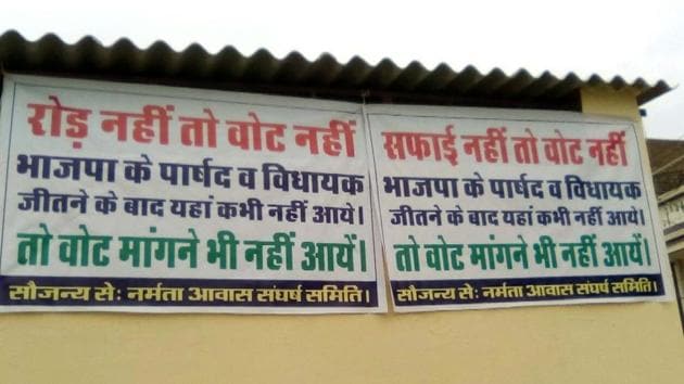 Banners put up by residents of Namrata Aawas colony of Kota in protest of ignorance of regional MLA and Corporator towards demand of road construction. (A.H. ZAIDI/HT PHOTO)