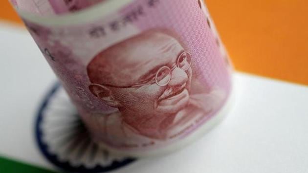 An Indian Rupee note is seen in this illustration photo. (Reuters Photo) An Indian Rupee note is seen in this illustration photo. (Reuters Photo)