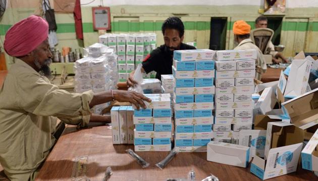 Men work at a cycle spare parts factory in Ludhiana. (AFP File Photo) Men work at a cycle spare parts factory in Ludhiana. (AFP File Photo)