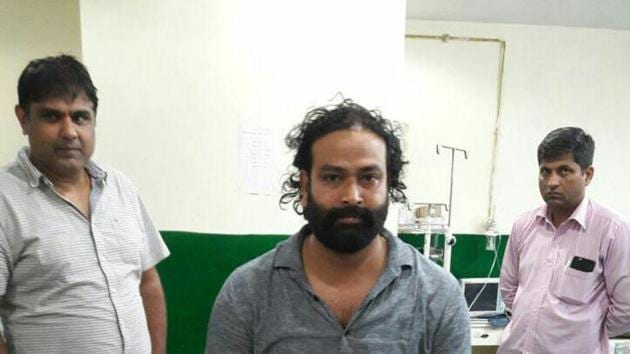 Gangster Akhilesh Singh at a hospital after his arrest at Gurugram in Haryana (HT Photo) Gangster Akhilesh Singh at a hospital after his arrest at Gurugram in Haryana (HT Photo)
