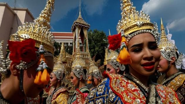 Thai dancers gather at the Great Victory Royal Chariot that will carry the late King Bhumibol Adulyadej’s body in a giant ornate urn to the cremation site, in Bangkok, Thailand. The nation is putting the finishing touches this month to a lavish five-day funeral ceremony in a final goodbye to its monarch, who helped shape the Southeast Asian nation for decades after World War Two. (Athit Perawongmetha / REUTERS) Thai dancers gather at the Great Victory Royal Chariot that will carry the late King Bhumibol Adulyadej’s body in a giant ornate urn to the cremation site, in Bangkok, Thailand. The nation is putting the finishing touches this month to a lavish five-day funeral ceremony in a final goodbye to its monarch, who helped shape the Southeast Asian nation for decades after World War Two. (Athit Perawongmetha / REUTERS)