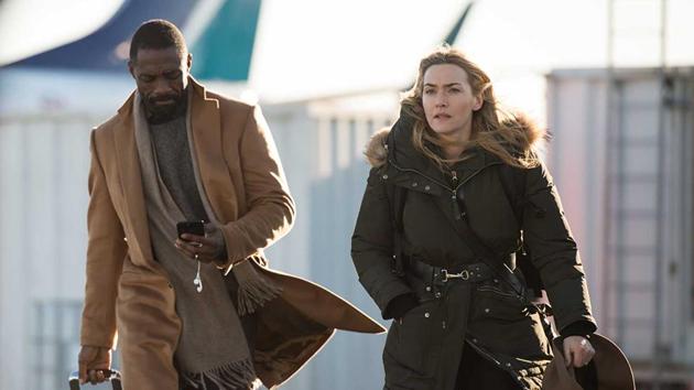 Idris Elba and Kate Winslet in a scene from The Mountains Between Us. Idris Elba and Kate Winslet in a scene from The Mountains Between Us.