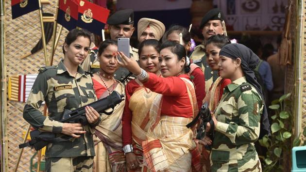 BSF Jawans from Assam take a selfie with commandos during the BSF Annual Welfare Meet and Exhibition 2017 at Dayal Singh college ground in New Delhi, India, on Friday, October 13, 2017. The meet will continue until Oct 15, 2017. (Raj K Raj / HT PHOTO)