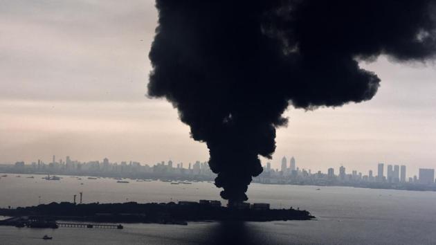 The fire at Butcher Island, off Mumbai’s coast, near Elephanta Caves raged on for three days, but fire-fighters managed to contain it to the one oil tank where it started. (Anshuman Poyrekar / HT Photo)