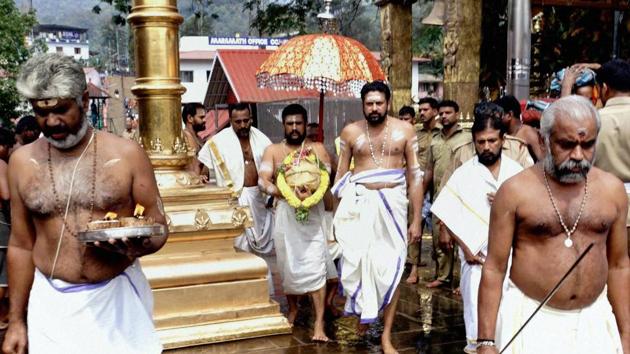 Sabarimala priests perform Kalalabhishekam at Sannidhanam in Sabarimala. (PTI Photo) Sabarimala priests perform Kalalabhishekam at Sannidhanam in Sabarimala. (PTI Photo)
