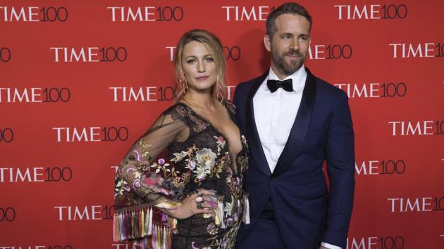 Blake Lively wears a Marchesa dress as she poses with her husband Ryan Reynolds at the TIME 100 Gala in New York. (Charles Sykes/Invision/AP) Blake Lively wears a Marchesa dress as she poses with her husband Ryan Reynolds at the TIME 100 Gala in New York. (Charles Sykes/Invision/AP)