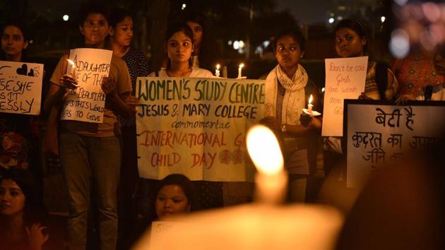 On October 11, Jesus & Mary college students took part in a candle march to mark the occasion of International Day of the Girl Child in New Delhi. (Arun Sharma / HT Photo)