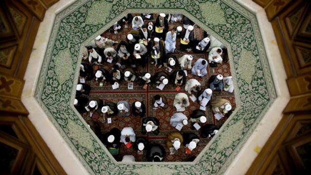 Shi’ite clerics study at al-Gharawiya school run by the Hawza al-Ilmiyya in Najaf, Iraq. For more than 1,000 years, the Hawza al-Ilmiyya south of Baghdad has been one of the hearts of Shi’ite Islamic scholarship, training clerics who lead Shi’ite communities across the Muslim world. (Abdullah Dhiaa Al-deen / REUTERS)