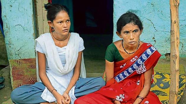 Geeta Bandu Sonule and her daughter are distraught after her husband Bandu Sonule died on September 21.(HT File Photo)
