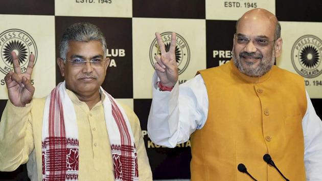 West Bengal BJP chief Dilip Ghosh with the party’s national president Amit Shah.(PTI File Photo)