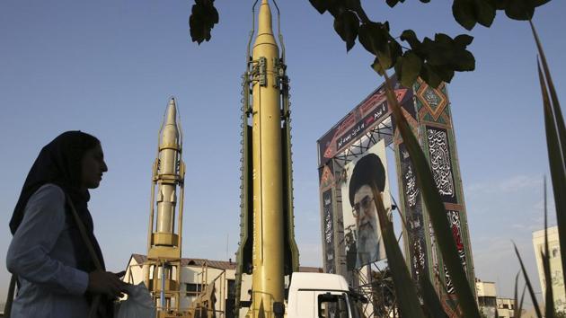 A Ghadr-H missile, a Sejjil missile and a portrait of the Supreme Leader Ayatollah Ali Khamenei are displayed at Baharestan Square in Tehran, Iran. (AP File Photo) A Ghadr-H missile, a Sejjil missile and a portrait of the Supreme Leader Ayatollah Ali Khamenei are displayed at Baharestan Square in Tehran, Iran. (AP File Photo)