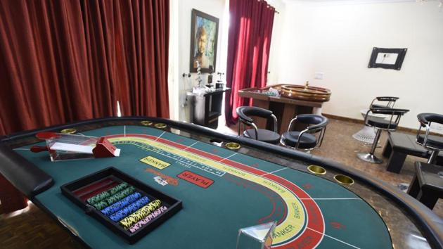 Gurgaon police had busted a casino operating out of a house in Block K, South City-1, on Wednesday night. The police arrested around 43 people and recovered a large amount of cash. (Sanjeev Verma/HT PHOTO) Gurgaon police had busted a casino operating out of a house in Block K, South City-1, on Wednesday night. The police arrested around 43 people and recovered a large amount of cash. (Sanjeev Verma/HT PHOTO)