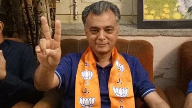 Anil Sharma wearing the BJP scarf on Saturday.(ANI Photo)