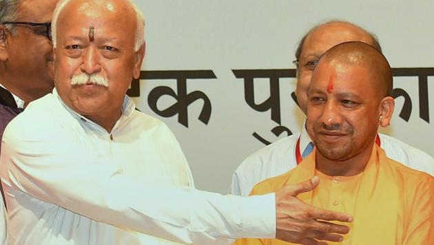 Uttar Pradesh chief minister Yogi Adityanath and RSS chief Mohan Bhagwat at the annual Bharatatma Ashokji Singhal Vedic Awards 2017 function in New Delhi on October 5, 2017. (PTI) Uttar Pradesh chief minister Yogi Adityanath and RSS chief Mohan Bhagwat at the annual Bharatatma Ashokji Singhal Vedic Awards 2017 function in New Delhi on October 5, 2017. (PTI)