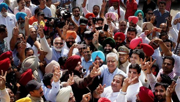 Punjab Congress president Sunil Jakhar celebrates with State cabinet minister Navjot Singh Sidhu and other party leaders after winning the Gurdaspur parliamentary bypoll, in Gurdaspur on Sunday. (PTI photo) Punjab Congress president Sunil Jakhar celebrates with State cabinet minister Navjot Singh Sidhu and other party leaders after winning the Gurdaspur parliamentary bypoll, in Gurdaspur on Sunday. (PTI photo)