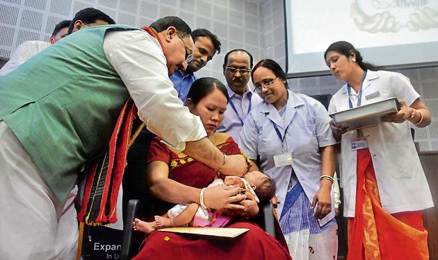 Union minister of health & family welfare JP Nadda administers vaccine to a child during the launch of second phase Expansion of Rotavirus Vaccination at Pragna Bhawan, Agartala in February this year. A wide range of vaccines are now available in India and the World Health Organisation lists 26 of them.(HT File Photo)