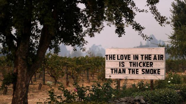 A sign is posted outside Cline Cellars on October 13, 2017 in Sonoma, California. (AFP Photo)