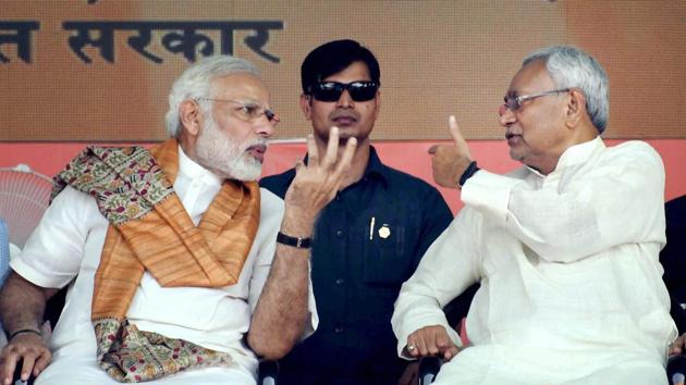 Prime Minister Narendra Modi and Bihar chief minister Nitish Kumar during the foundation stone laying ceremony of projects under Namami Gange and National Highway in Mokama, Bihar.(PTI Photo)