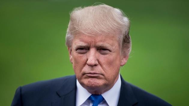 US President Donald Trump pauses while speaking to the press on the South Lawn of the White House October 13, 2017 in Washington.(AFP Photo) US President Donald Trump pauses while speaking to the press on the South Lawn of the White House October 13, 2017 in Washington.(AFP Photo)