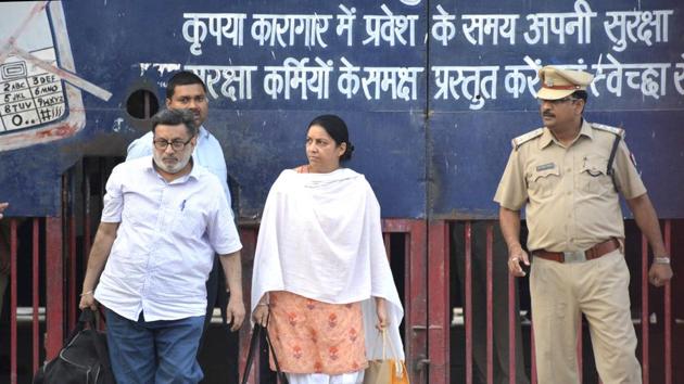 Rajesh and Nupur Talwar come out of Dasna Jail, four years after they were sentenced to life imprisonment in the Aarushi-Hemraj murders case. The couple was acquitted by Allahabad HC on Thursday.(Sakib Ali/HT Photo)
