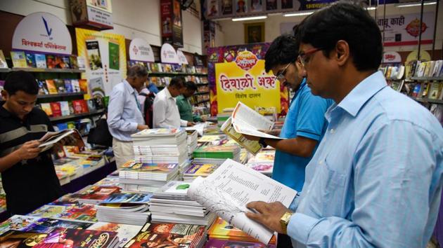 An exhibition of special Marathi Diwali magazines organised by Akshardhara book store on Bajirao Road saw very few customers on Monday.(Sanket Wankhade/HT PHOTO)