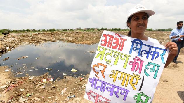 Residents of Sector 137 had filed a petition with the NGT, objecting to the dumping of waste and seeking an end to such activities due to health concerns. (Virendra Singh Gosain/HT FILE PHOTO) Residents of Sector 137 had filed a petition with the NGT, objecting to the dumping of waste and seeking an end to such activities due to health concerns. (Virendra Singh Gosain/HT FILE PHOTO)