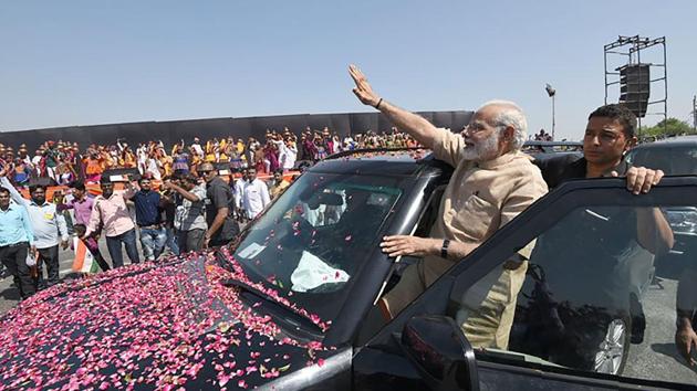 Prime Minister Narendra Modi greets people during a public rally at Vadnagar in Gujarat recently. (AFP/ PIB handout) Prime Minister Narendra Modi greets people during a public rally at Vadnagar in Gujarat recently. (AFP/ PIB handout)