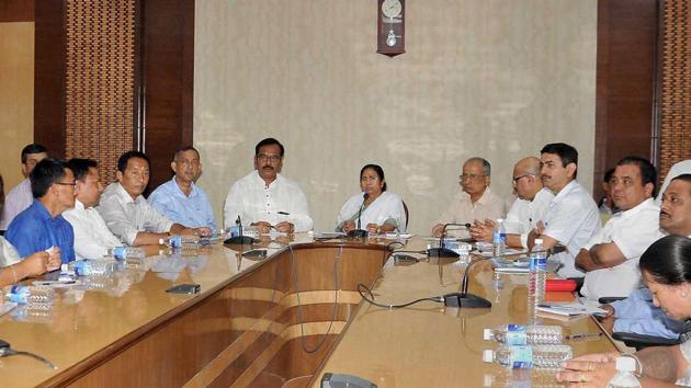 West Bengal chief minister Mamata Banerjee holds an all-party meeting regarding Darjeeling issues with Board of Administrator (BoA) for Darjeeling, chairman and GJM (Gorkha Janamukti Morcha) rebel leader Binay Tamang and others at Nabanna (State Secretariat) in Kolkata on Monday. (PTI Photo) West Bengal chief minister Mamata Banerjee holds an all-party meeting regarding Darjeeling issues with Board of Administrator (BoA) for Darjeeling, chairman and GJM (Gorkha Janamukti Morcha) rebel leader Binay Tamang and others at Nabanna (State Secretariat) in Kolkata on Monday. (PTI Photo)