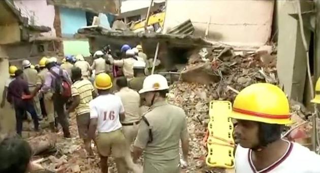 Rescue workers are seen following a building collapse in Bengaluru, Karnataka, India in this still frame taken from video October 16, 2017. (ANI/via REUTERS TV) Rescue workers are seen following a building collapse in Bengaluru, Karnataka, India in this still frame taken from video October 16, 2017. (ANI/via REUTERS TV)