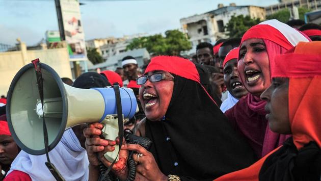 People chant slogans as they protest against the attack in Mogadishu on Sunday. The US condemned the bombing ‘in the strongest terms’ in a statement released by the State Department. British Foreign Secretary Boris Johnson and French President Emmanuel Macron also joined in condemning the attacks, expressing solidarity with Somalia. Turkey, a leading donor and investor in the African nation has also promised to provide medical aid to the country. (Mohamed Abdiwahab / AFP)