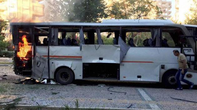A bus carrying police officers still burning shortly after a bomb went off as the bus was passing by in Mersin in southern Turkey, Tuesday, Oct. 17, 2017. (AP) A bus carrying police officers still burning shortly after a bomb went off as the bus was passing by in Mersin in southern Turkey, Tuesday, Oct. 17, 2017. (AP)