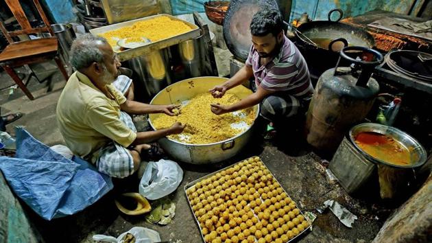 Diwali is arguably India’s biggest festival, celebrated with much fanfare and never without a large share of sweets. Here in Kolkata, men are seen busy making ‘laddoos’ at a sweet shop.  (Swapan Mahapatra / PTI) 