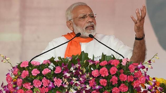 Prime Minister Narendra Modi addresses a gathering of BJP supporters during Gujarat Gaurav Mahasamellan at Bhaat village on the outskirts of Ahmedabad. (AFP Photo) Prime Minister Narendra Modi addresses a gathering of BJP supporters during Gujarat Gaurav Mahasamellan at Bhaat village on the outskirts of Ahmedabad. (AFP Photo)