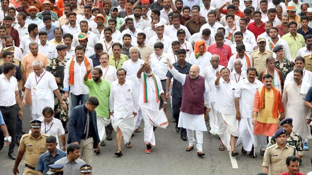 BJP president Amit Shah and party leaders during the Janaraksha Yatra at Thiruvananthapuram in Kerala on Tuesday. (Vivek Nair/ HT Photo) BJP president Amit Shah and party leaders during the Janaraksha Yatra at Thiruvananthapuram in Kerala on Tuesday. (Vivek Nair/ HT Photo)