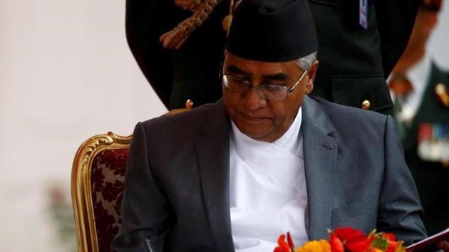 Nepalese Prime Minister Sher Bahadur Deuba signs the oath after swearing-in ceremony at the presidential building in Kathmandu, on June 7, 2017. (Reuters File Photo) Nepalese Prime Minister Sher Bahadur Deuba signs the oath after swearing-in ceremony at the presidential building in Kathmandu, on June 7, 2017. (Reuters File Photo)