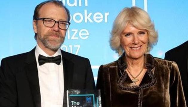 Britain’s Camilla, Duchess of Cornwall, presents US author George Saunders with the award for the 2017 Man Booker Prize for Fiction, at the Guildhall in central London on October 17.(AFP)