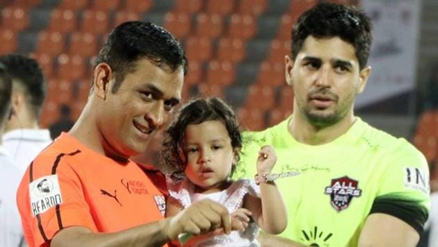 MS Dhoni and daughter Ziva during the Celebrity Clasico charity football match in Mumbai on Sunday. Several Bollywood stars like Sidharth Malhotra took part in the match. (Twitter) MS Dhoni and daughter Ziva during the Celebrity Clasico charity football match in Mumbai on Sunday. Several Bollywood stars like Sidharth Malhotra took part in the match. (Twitter)