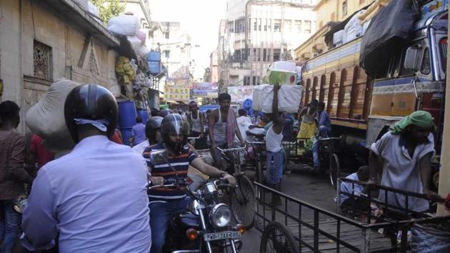 After the tournament was over, life returned to its frenetic pace in the narrow street. (Samir Jana / HT Photo)