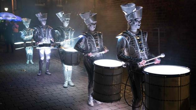 Performers take part in the illuminated Night Carnival Parade, a feature of the annual ‘Light Night Leeds’ festival of visual arts in Leeds, England. The festival features projections, interactive installations, exhibitions, dance, music and street performances in the centre of the city. (Oli Scarff / AFP)